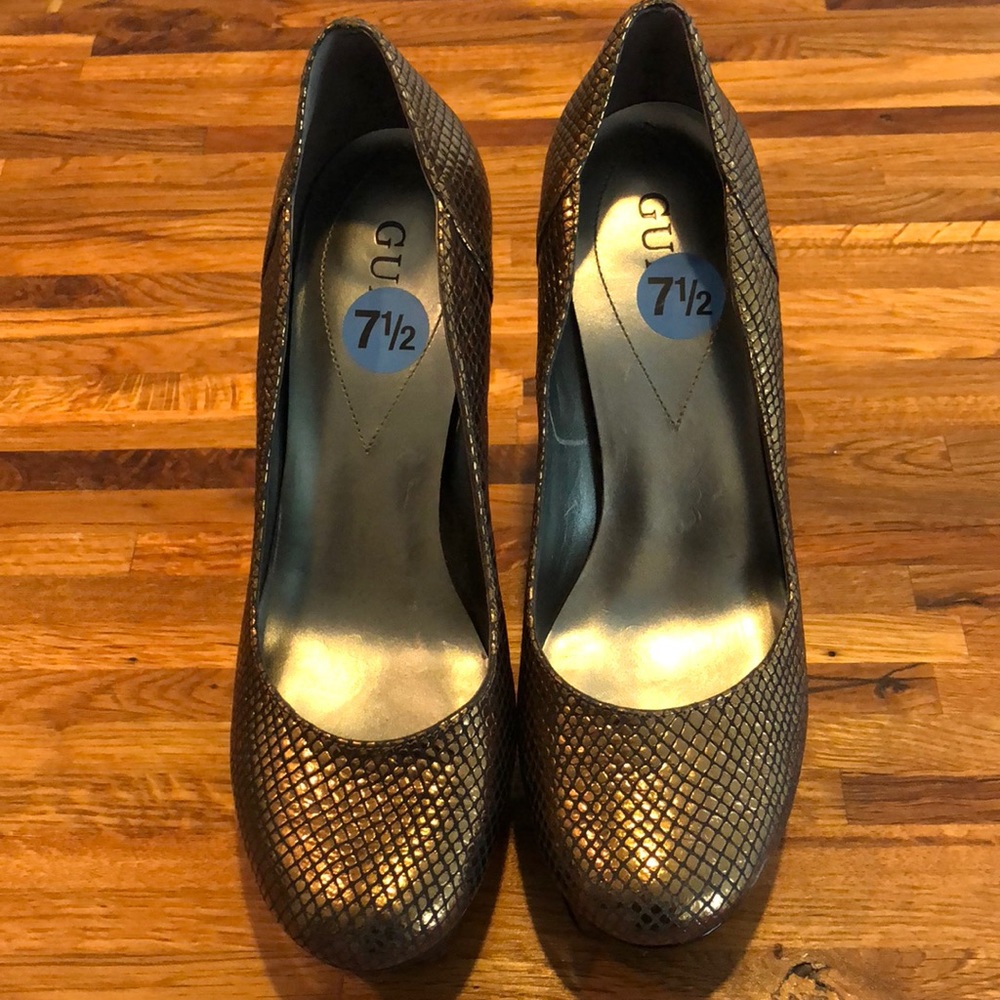 GUESS gold and black platform heels